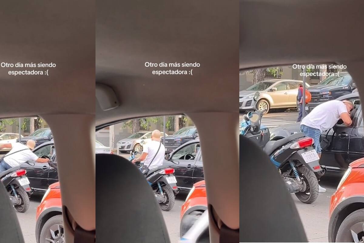VIDEO: en pleno tráfico, un hombre se baja de su moto para besar a la persona que tenía al lado